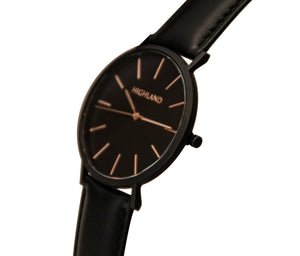 Minimal black wrist watch with black leather strap for men